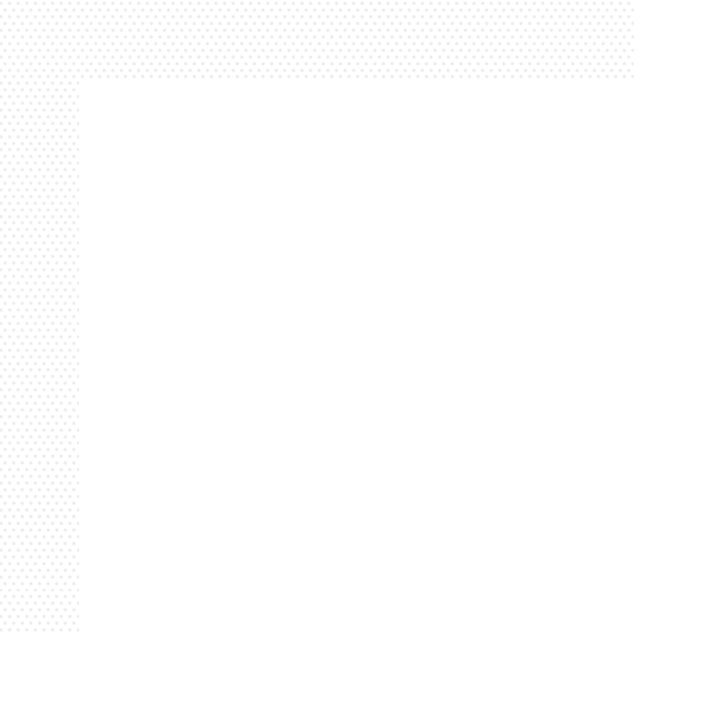 A close-up view of a piece of white cardstock with a subtle dot pattern on the right edge.